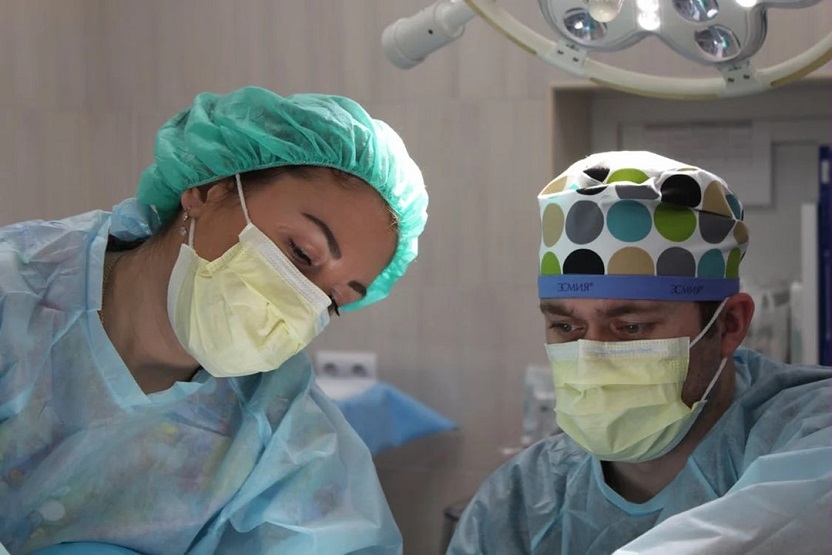 healthcare professionals, physicians in operating room, free surgery